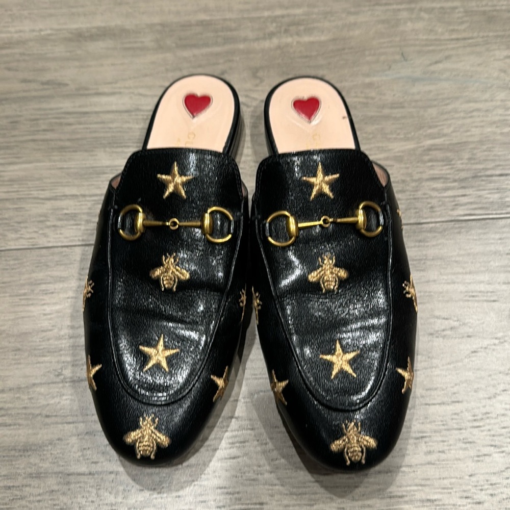 Gucci star and bee logo.